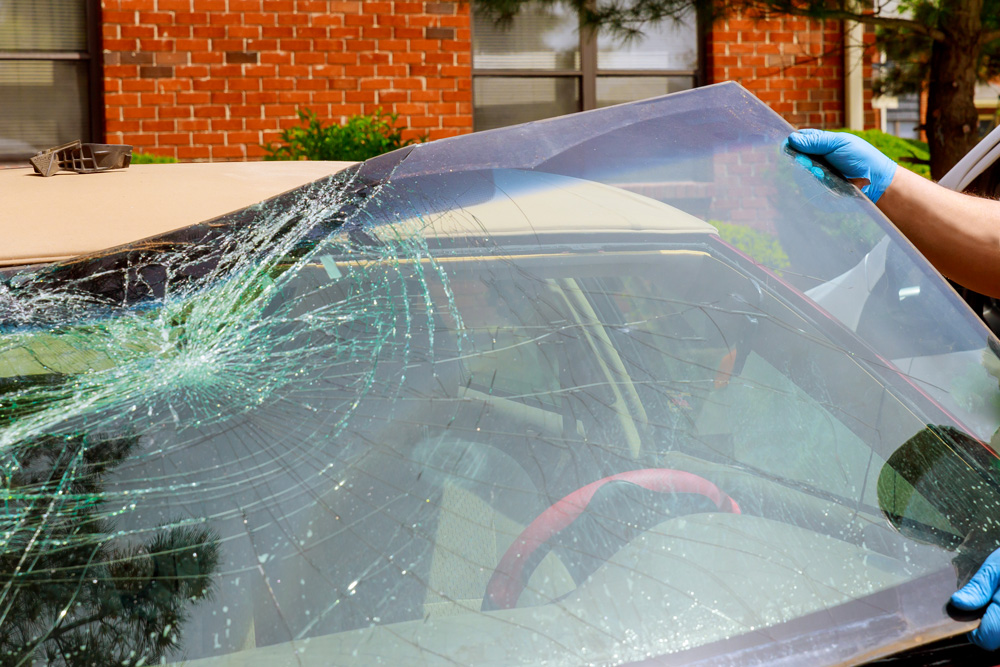 removing cracked windshield from vehicle